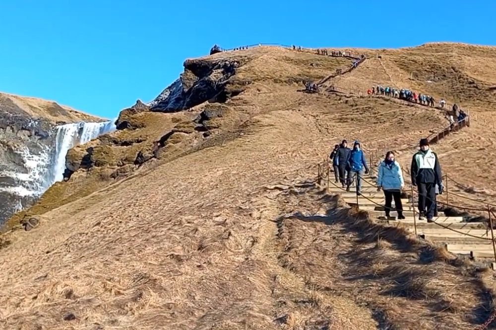 Iceland's overtourism problem: what every traveler needs to know before they go eroded hillside skogafoss iceland tourist trail