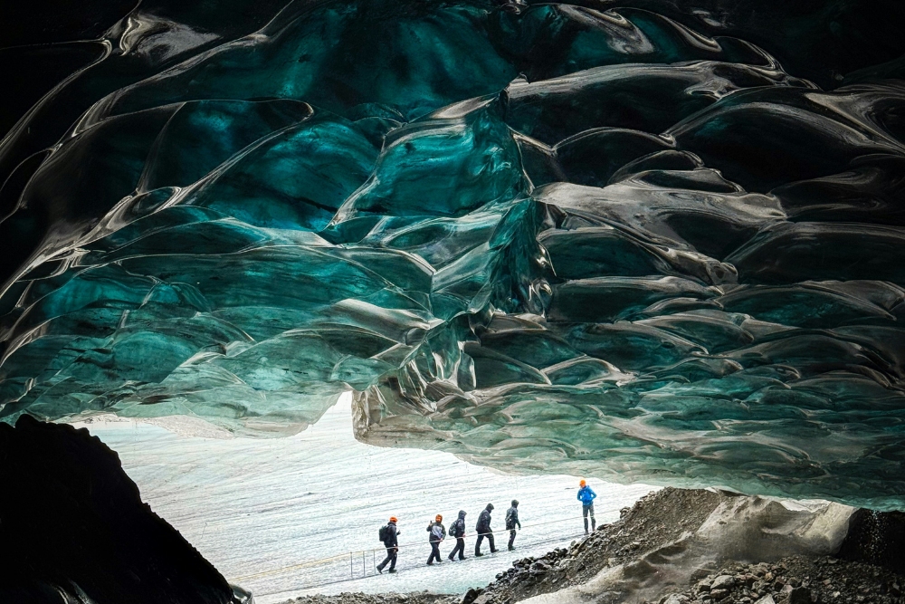 into the blue , walking the edge of a glacial cathedral