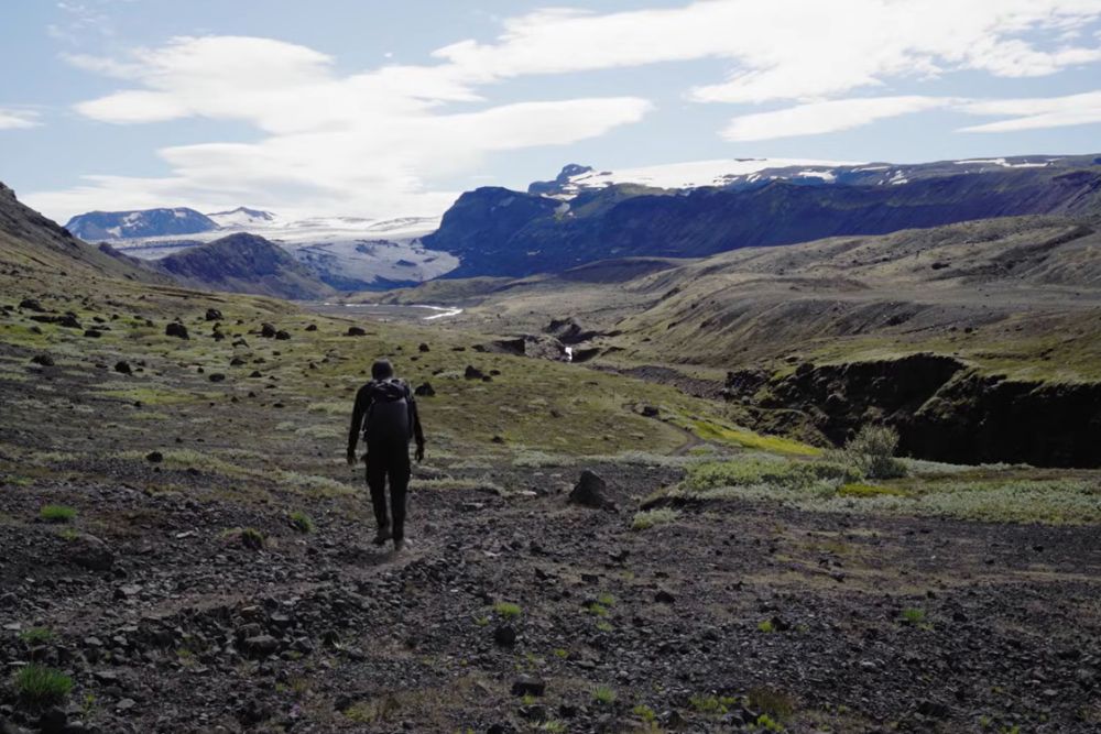 Iceland's overtourism problem: what every traveler needs to know before they go solo hiker iceland highland glacier landscape