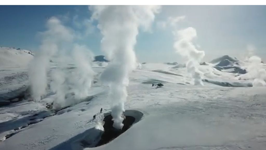 steam rising from geothermal vent in iceland highlands