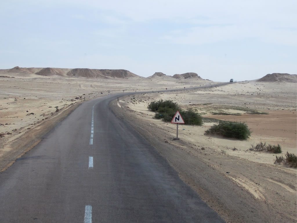Empty highway between Laayoune and Dakhla crossing the Western Sahara