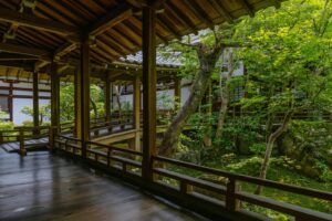 Traditional Japanese ryokan engawa wooden veranda overlooking a lush garden