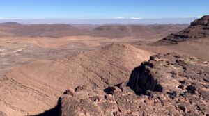 Anti-Atlas geology: panoramic view of red sedimentary strata in southern Morocco