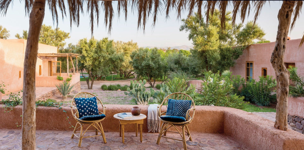 Traditional Berber lounge interior at an eco-certified kasbah lodge in Morocco's Anti-Atlas