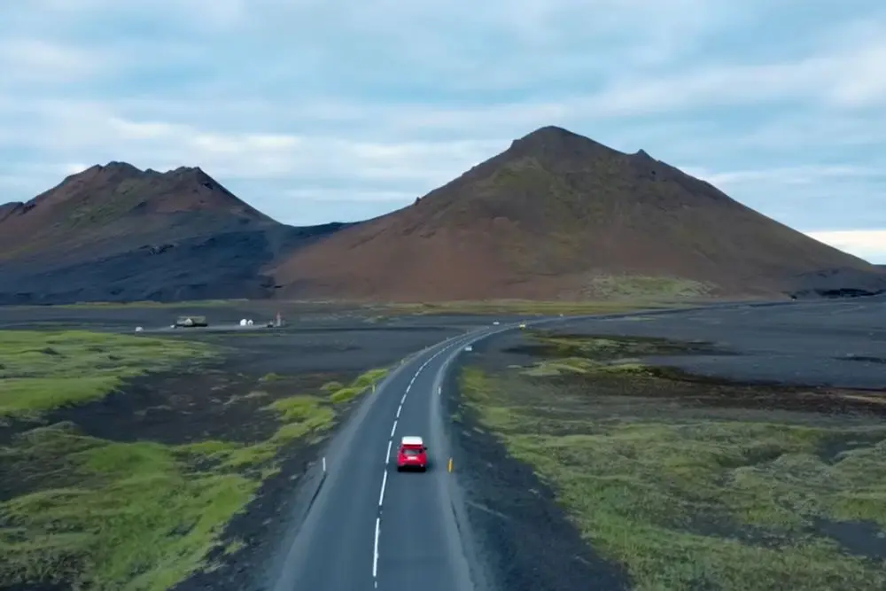 Iceland self-drive routes: an empty road along Route 1 through a volcanic landscape