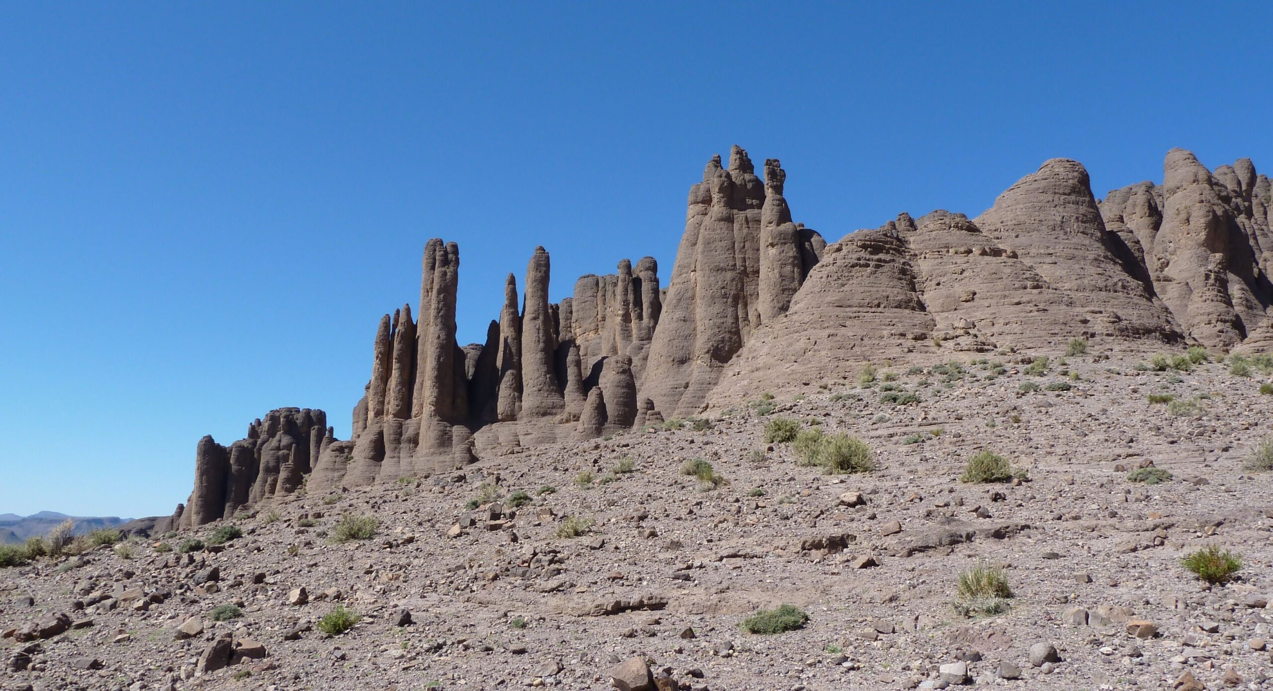 Jbel Saghro geology: ignimbrite volcanic rock towers rising from the plateau in Morocco's Anti-Atlas
