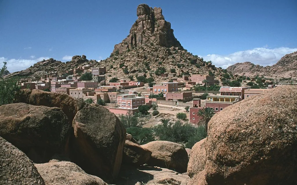 Granite hills and a rocky spire above a village in the Anti-Atlas near Tafraoute