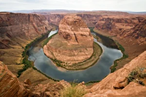 Horseshoe Bend Arizona seen from the overlook with the Colorado River making a tight U-turn 300 meters below the sandstone cliffs